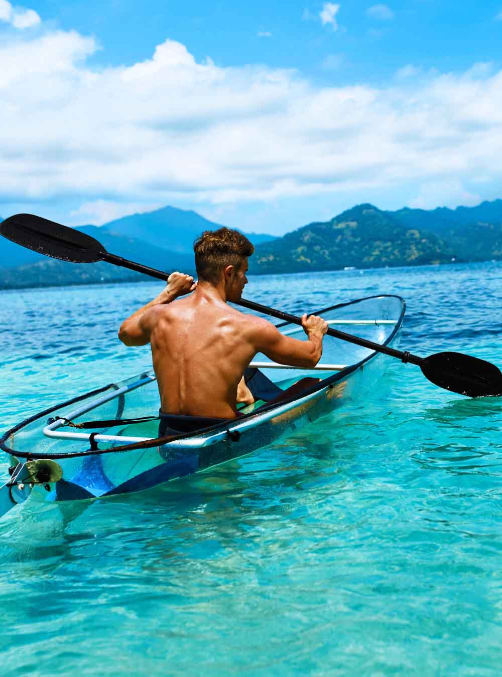 ocean kayaking, best ocean kayak, man kayaking on the sea, blue water kayaking, beast kayaking place in the world, Mabul Island Kayaking, Mabul island outdoor activities